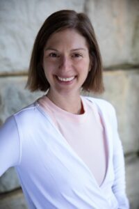 Yoga physical therapy pioneer Diana Zotos Florio smiling in photo.