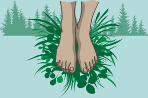 Image of feet touching the earth, representing grounding mindful movement practices.