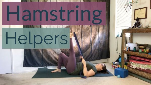 Addie doing a hamstring stretch during a mindful yoga therapy class online.
