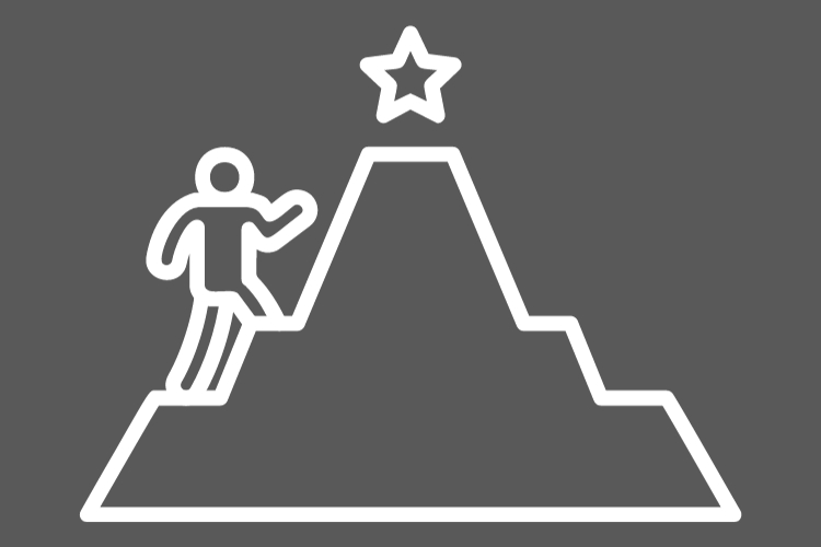 Person practicing Wise Effort and mindful movement as they climb a mountain.