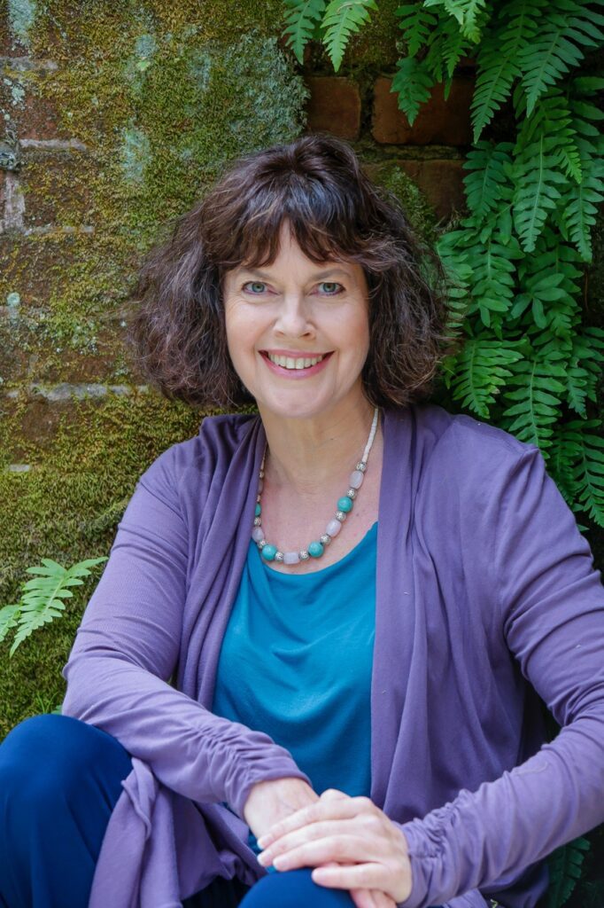 Picture of Anne Cushman, who discusses her mindful yoga career on the Moved To Meditate Podcast.